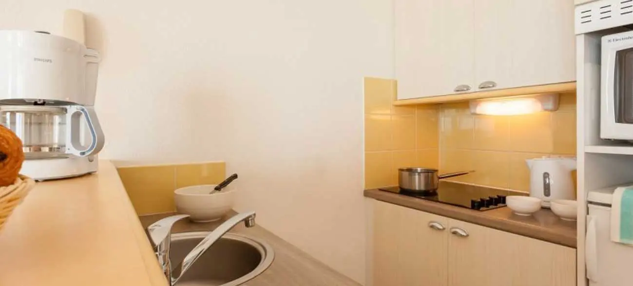 Cuisine dans appartement en location de vacances Résidence Cap Morgat